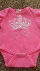 The front of My'isha's 1st birthday onesie.